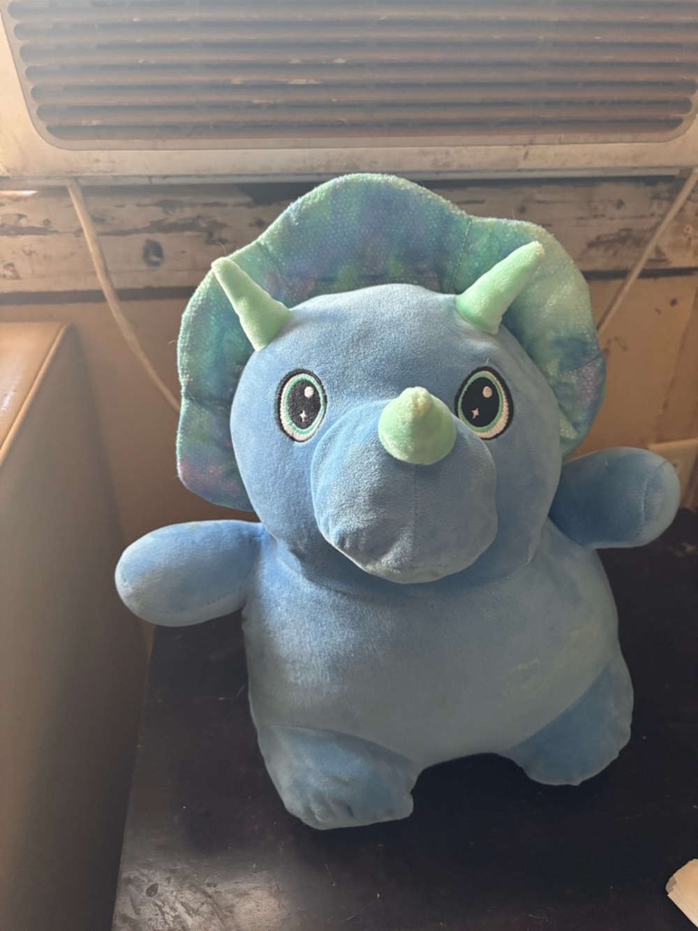 Blue Triceratops Plush Toy with Green Accents